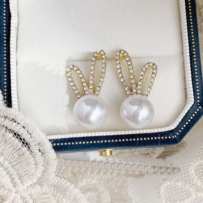 Επίχρυσα σκουλαρίκια με πέρλα και ζιργκόν ''elegant rabbit''