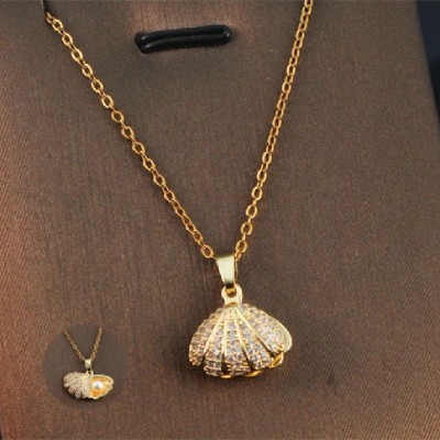 Επίχρυσο κολιέ κοχύλι με πέρλα