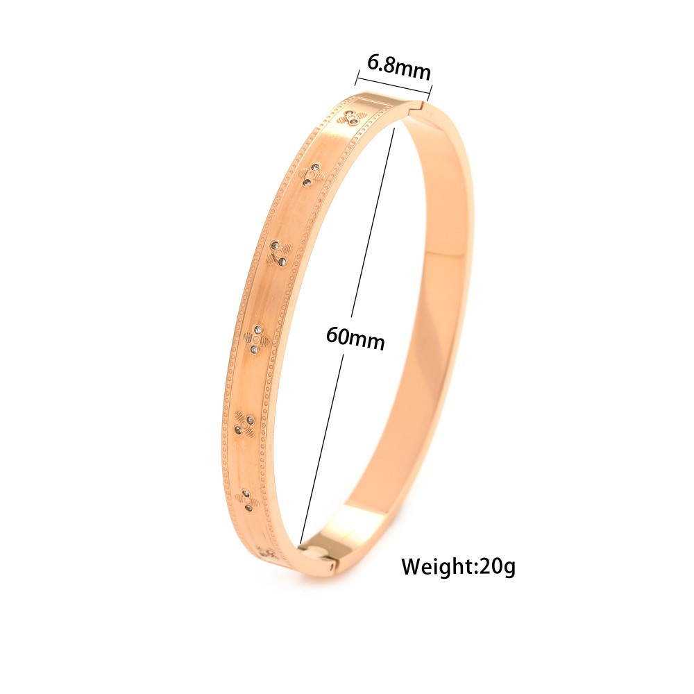 Ατσάλινη επίχρυση χειροπέδα με ανάγλυφα στοιχεία Αξεσουάρ