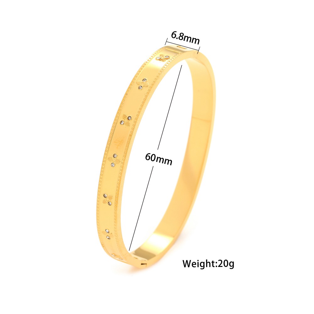 Ατσάλινη επίχρυση χειροπέδα με ανάγλυφα στοιχεία Αξεσουάρ